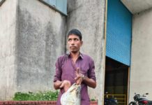 কাপ্তাই বিদ্যুৎ কেন্দ্রে ধরা পড়লো ২৬ কেজি ওজনের কোরাল মাছ